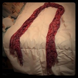 A pink/purple leaperd print scarf